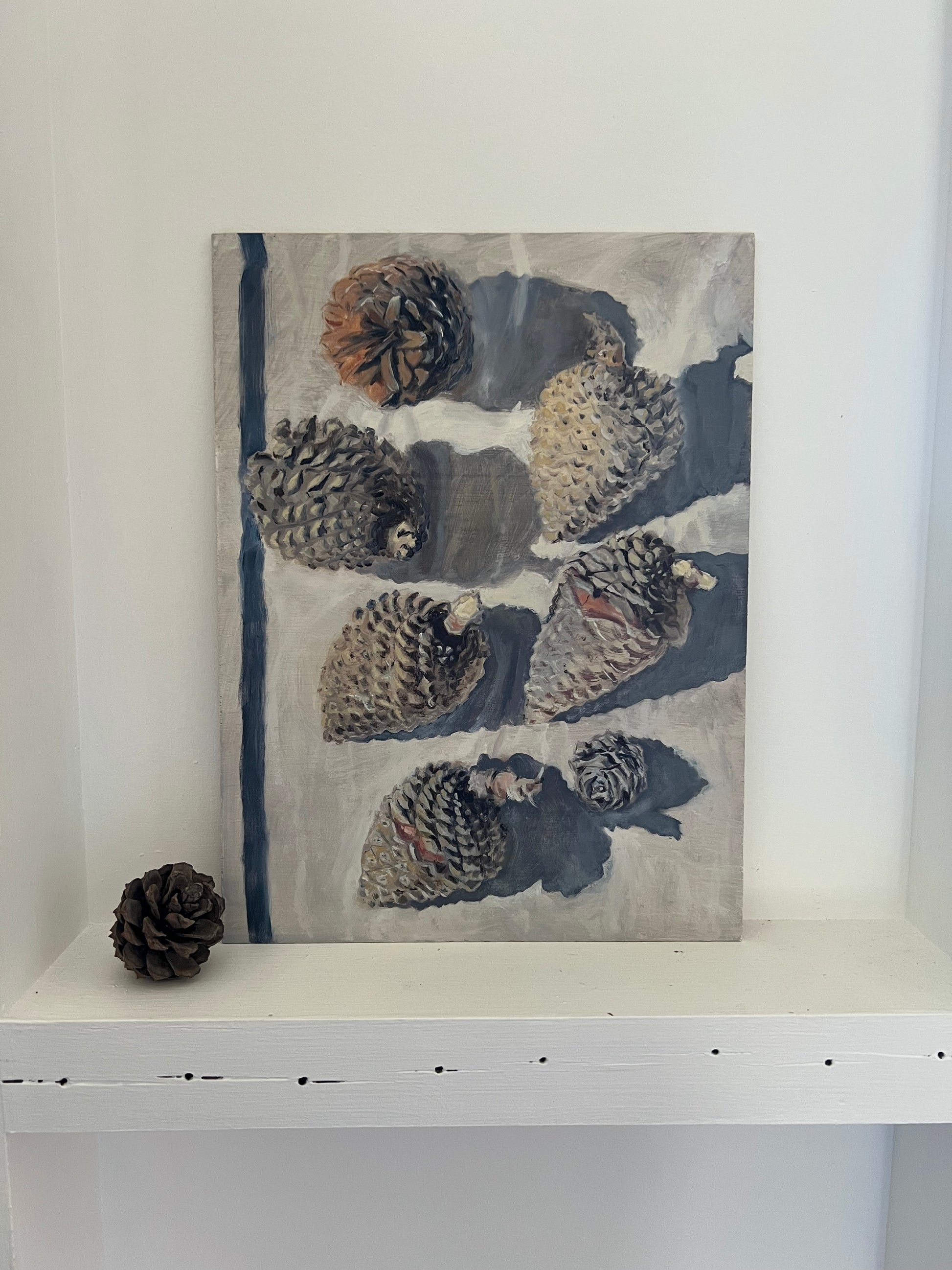 Simone Hale - Gathered Pinecones on a Navy Striped Tea Towel